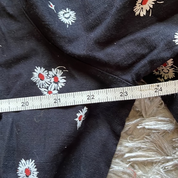 Logan Daisy Print Long Sleeve Cotton Jumpsuit In Black Multi - Picture 11 of 14